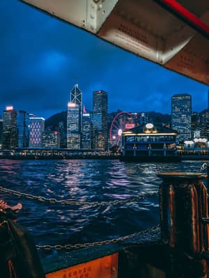 HKHKG Hong Kong person standing on boat during night time sankalp sharma.jpg Photo